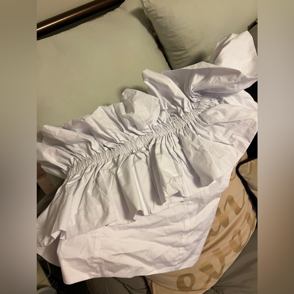White one shoulder with ruffles top. Only worn once. From riff-raff.